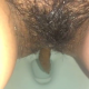 A very cute girl filmed from under the toilet seat. Pee stream into the bowl. No pooping shown. Brief clip. Filmed from a between the legs perspective. Vertical format video. Almost a minute and a half.